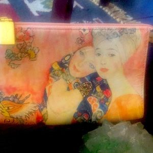 - Icon Los Angeles makeup/ clutch bag